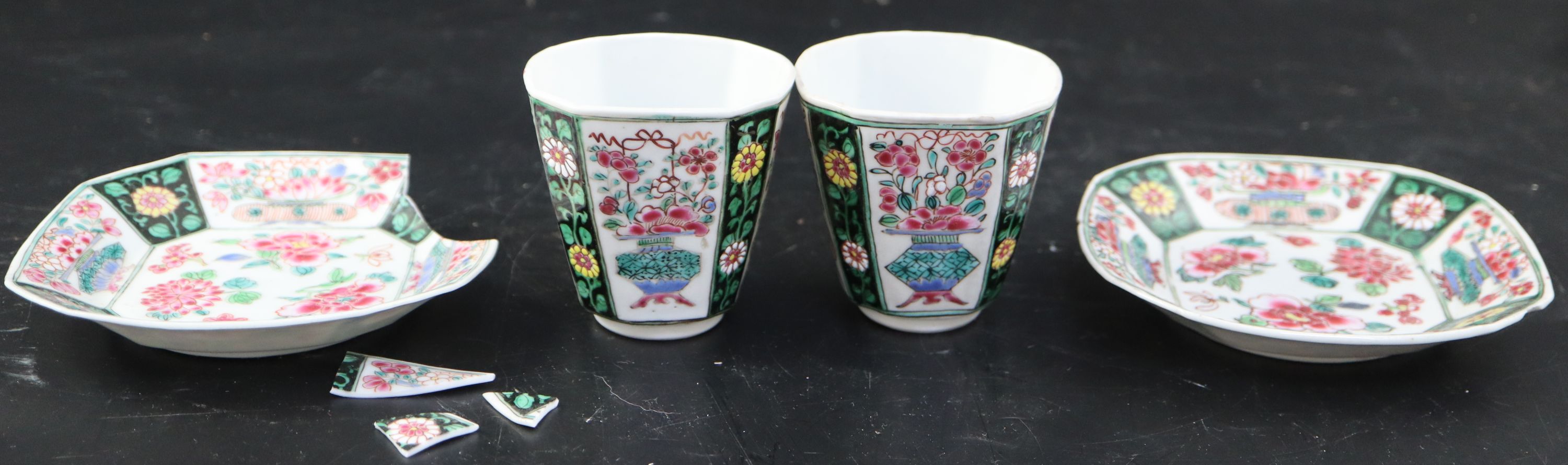 A pair of Chinese Qianlong famille rose octagonal cups and saucers, saucers 12cm cups height 6.5cm diameter 6.75cm